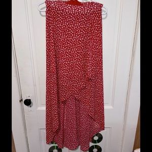 Perfect for spring and summer. High/low red floral skirt